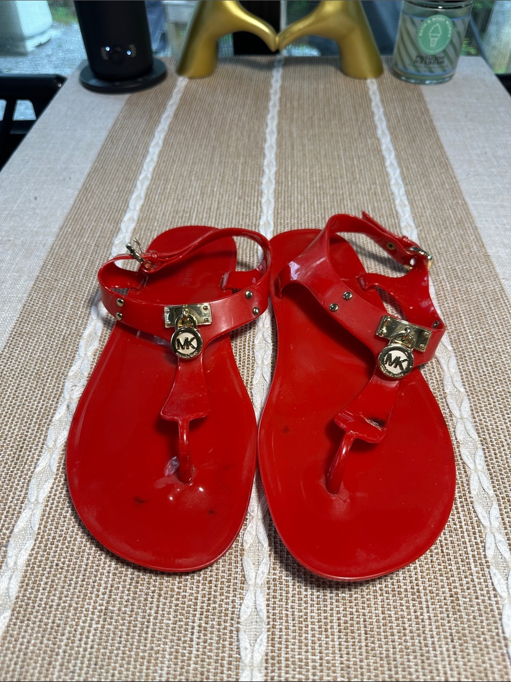 Michael Kors Red Jelly T-Strap Sandals with Gold MK Accents
